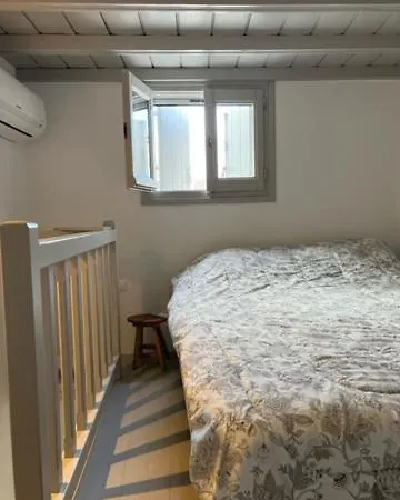 Traditional Myconian In The Heart Of Chora